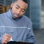Man using a tablet. Artificial Intelligence Governance File Sharing