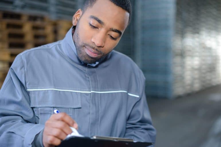 Man using a tablet. Artificial Intelligence Governance File Sharing